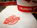 Texas Chicken or Church`s Chicken restaurant branding logo on tissue paper.